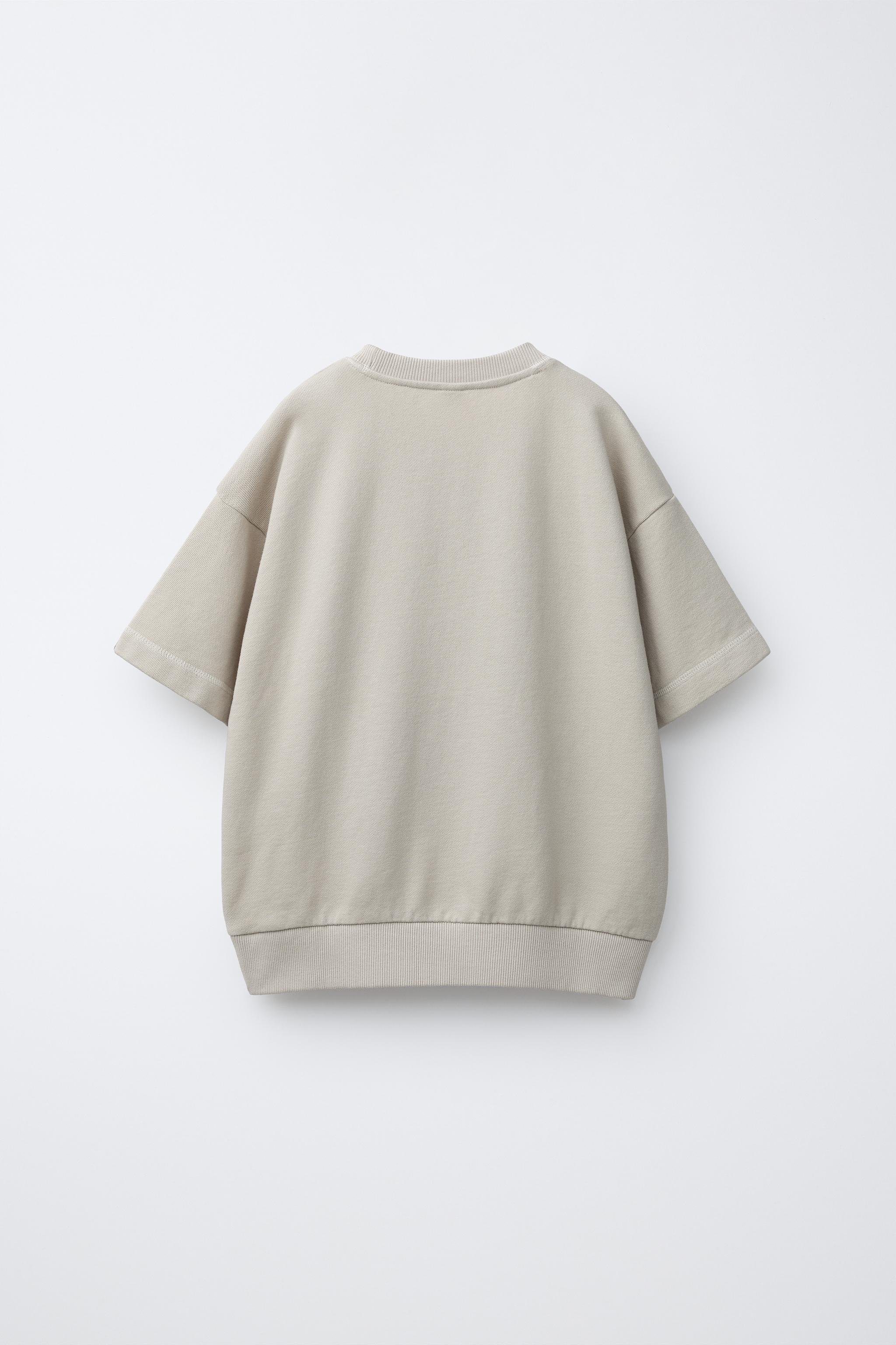 T-SHIRT MOLLETONNÉ À ÉTIQUETTE